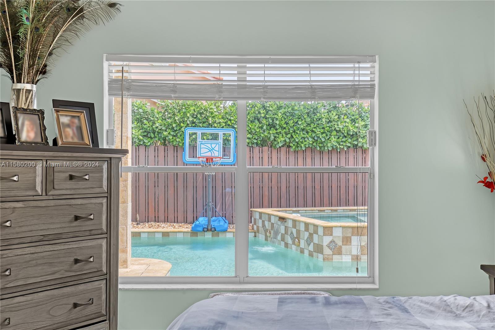 147 Stonebriar Boulevard Jupiter, FL 33458 - Photo 21 of 39 a view of a door and a window