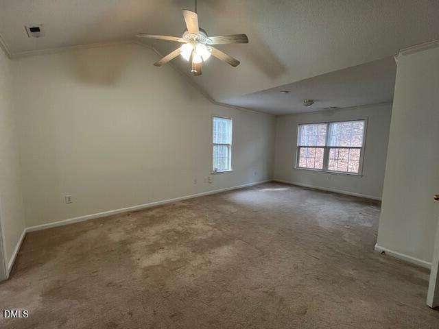 4514 Conklin Drive Durham, NC 27713 - Photo 14 of 32 en empty room with windows and chandelier fan