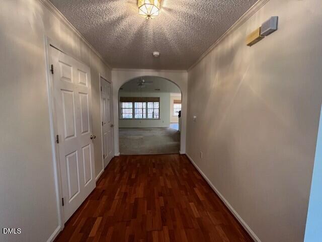 4514 Conklin Drive Durham, NC 27713 - Photo 2 of 32 a view of a hallway with wooden floor and a chandelier