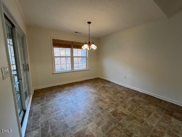 4514 Conklin Drive Durham, NC 27713 - Photo 30 of 32 en empty room with windows and ceiling fan
