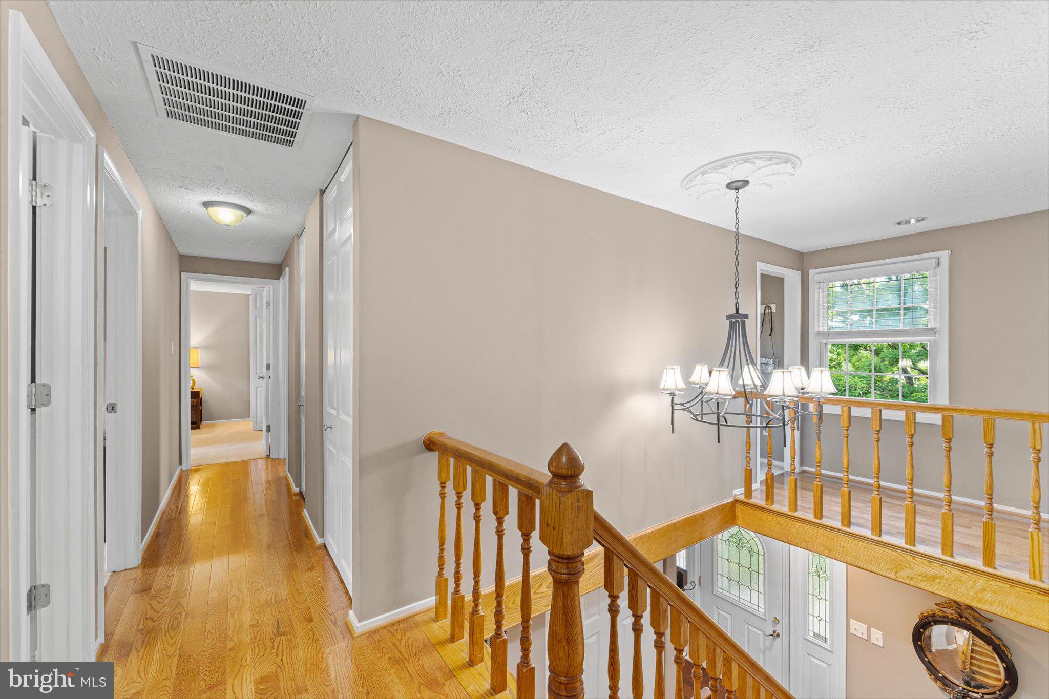 7561 Vogels Way Springfield, VA 22153 - Photo 39 of 79 UPPER LEVEL HALL - View From Primary Suite