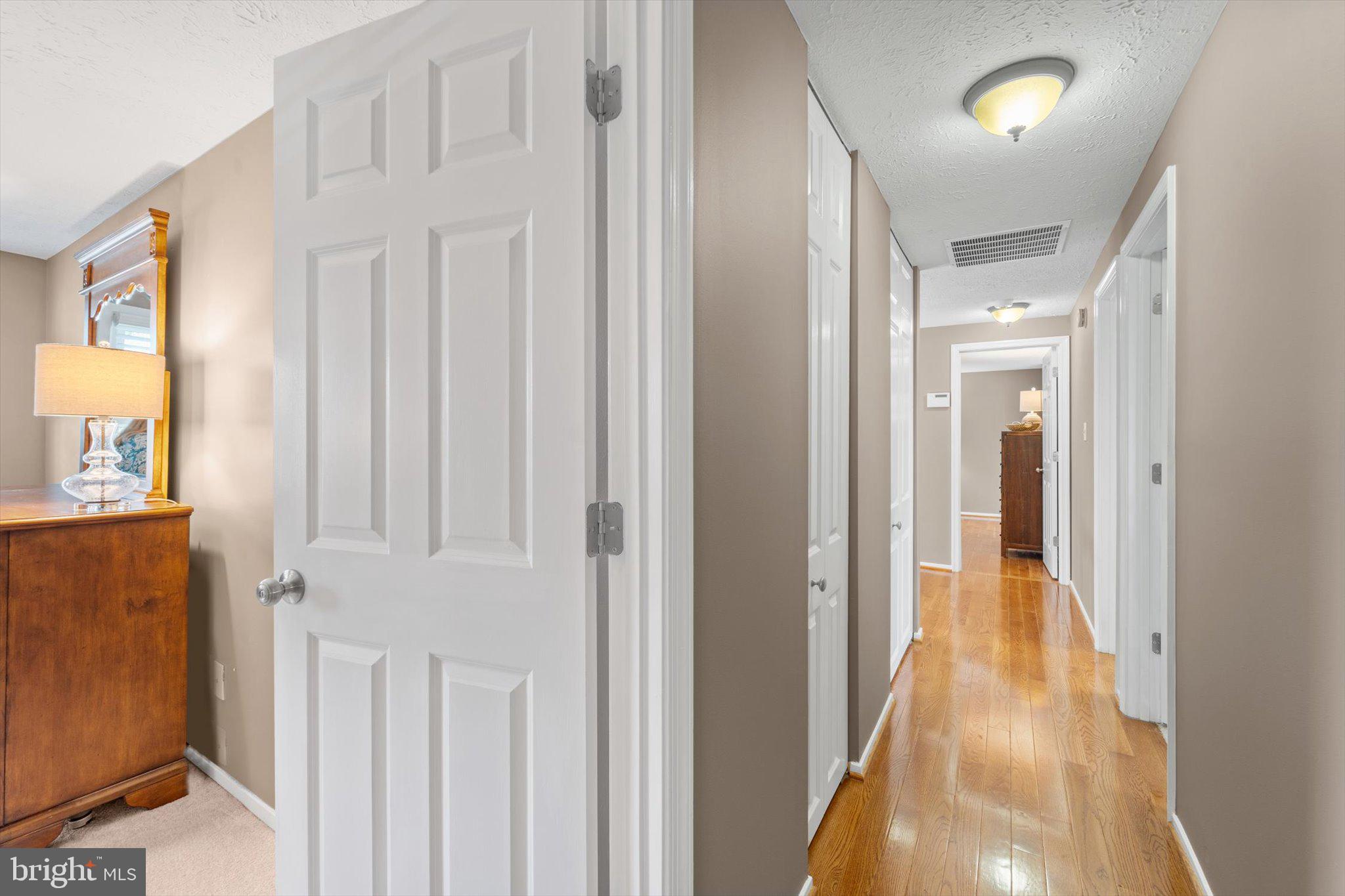 7561 Vogels Way Springfield, VA 22153 - Photo 40 of 79 UPPER LEVEL HALL - View Towards Primary Suite