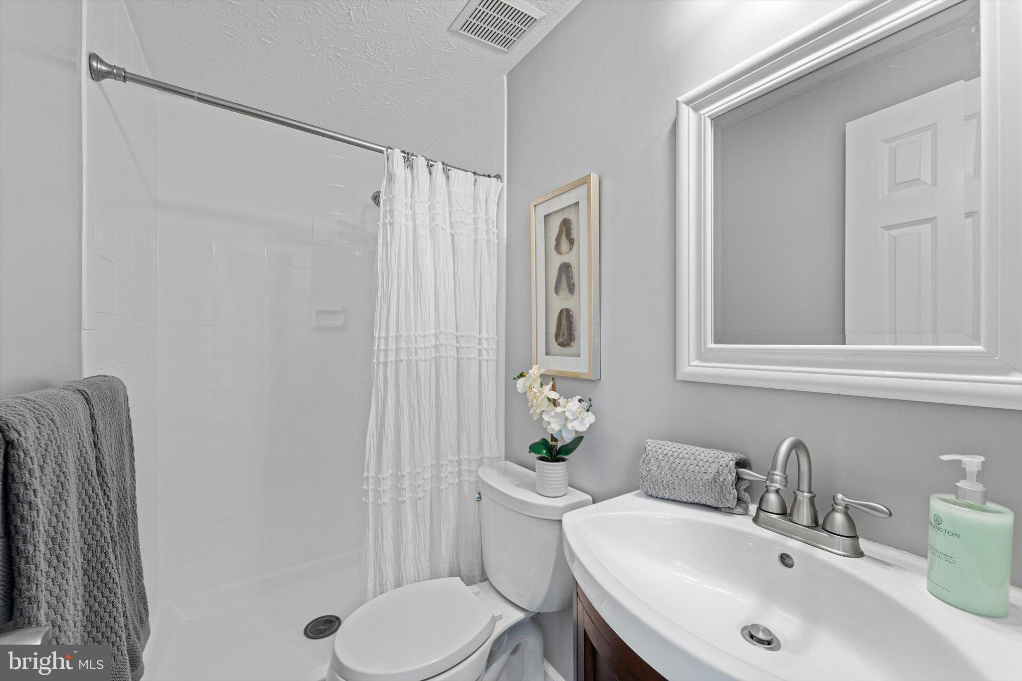 7561 Vogels Way Springfield, VA 22153 - Photo 45 of 79 PRIMARY BATHROOM WITH SHOWER