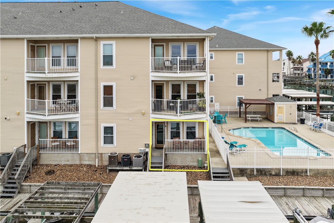 14427 Compass Street, Unit A6 Corpus Christi, TX 78418 - Photo 27 of 40 a house view with a outdoor space