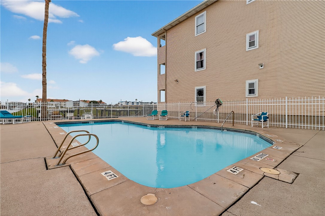 14427 Compass Street, Unit A6 Corpus Christi, TX 78418 - Photo 32 of 40 a view of a swimming pool kitchen