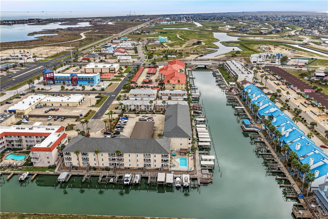14427 Compass Street, Unit A6 Corpus Christi, TX 78418 - Photo 36 of 40 an aerial view of residential building and lake