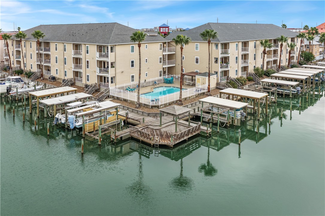 14427 Compass Street, Unit A6 Corpus Christi, TX 78418 - Photo 38 of 40 a picture of city view with lake view and residential houses