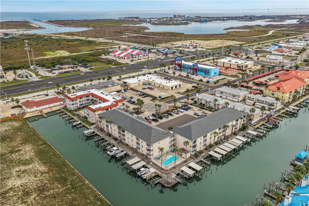 14427 Compass Street, Unit A6 Corpus Christi, TX 78418 - Photo 39 of 40 a view of a city with an ocean view