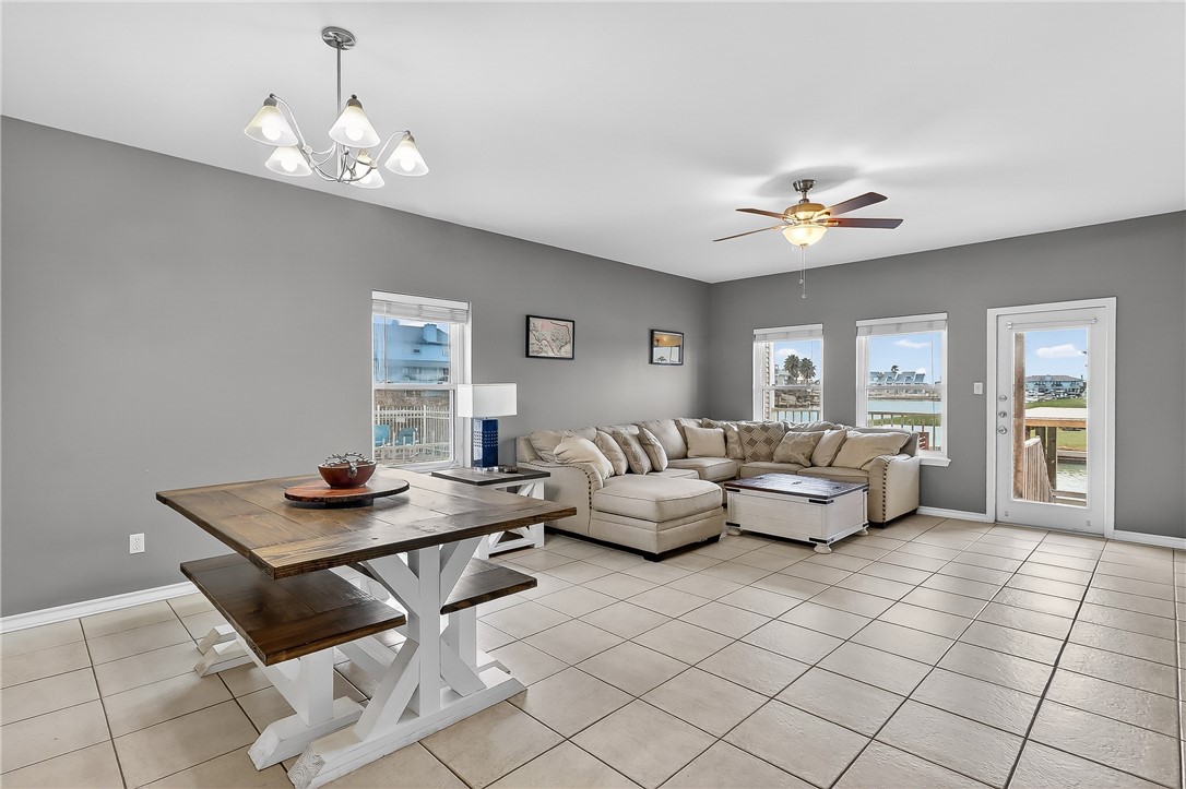 14427 Compass Street, Unit A6 Corpus Christi, TX 78418 - Photo 4 of 40 a living room with furniture and a table