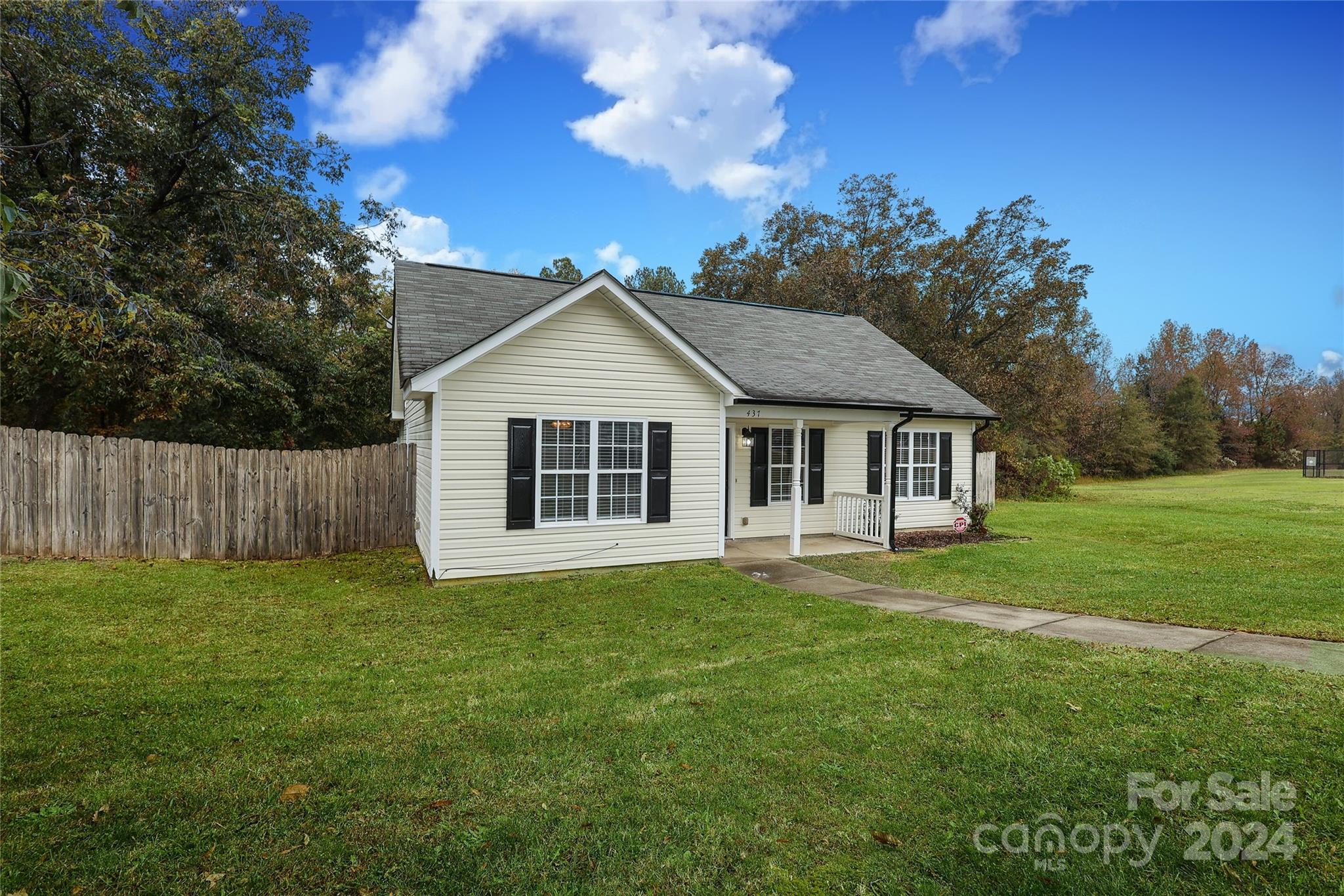 437 Radio Road Charlotte, NC 28216 - Photo 2 of 30 a front view of a house with a yard