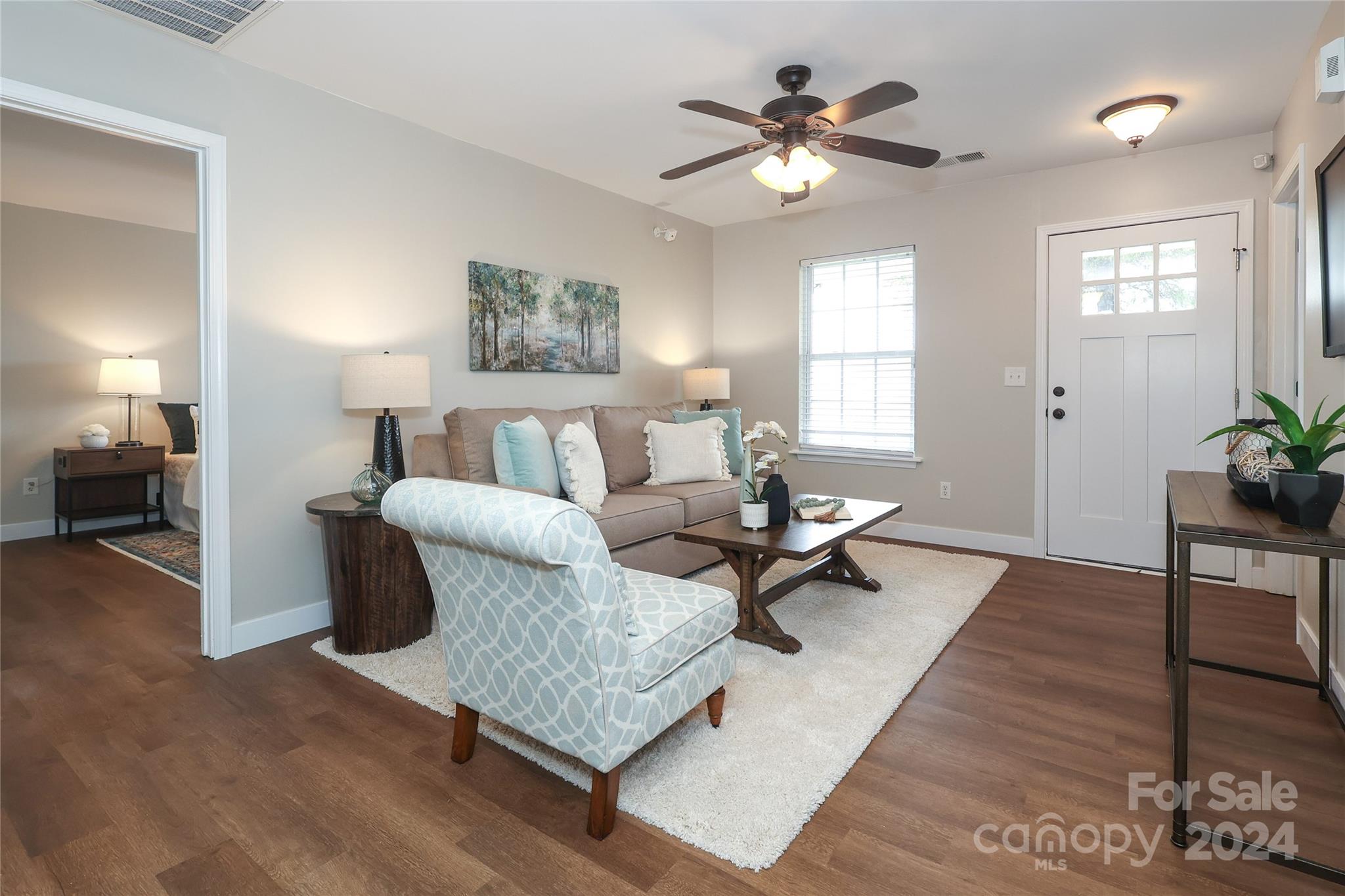 437 Radio Road Charlotte, NC 28216 - Photo 4 of 30 a living room with furniture rug and window