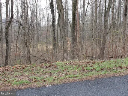 a view of wooden fence of a house