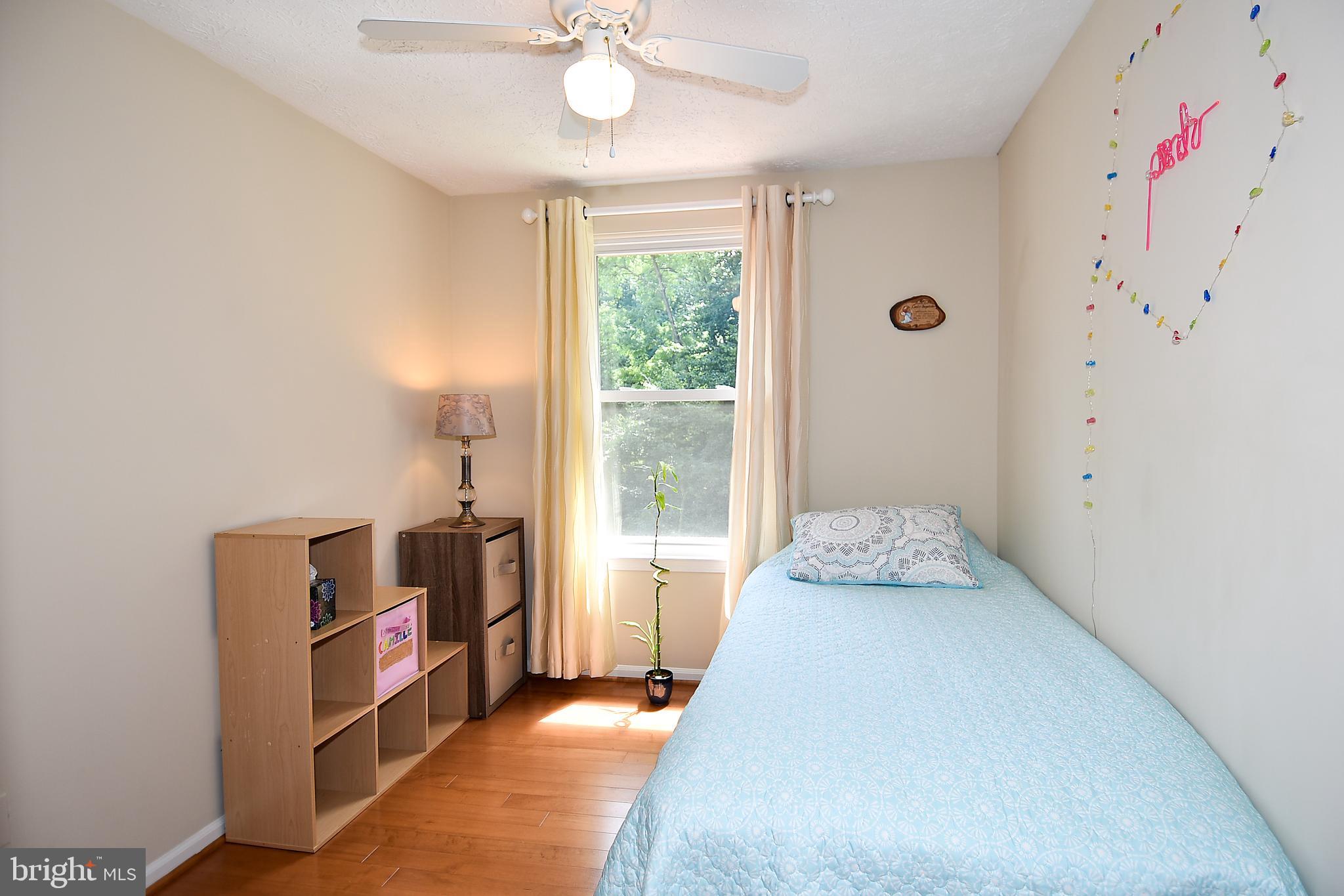 6591 Forest Dew Court Springfield, VA 22152 - Photo 23 of 39 Light and bright 3nd bedroom w/ hardwood floors