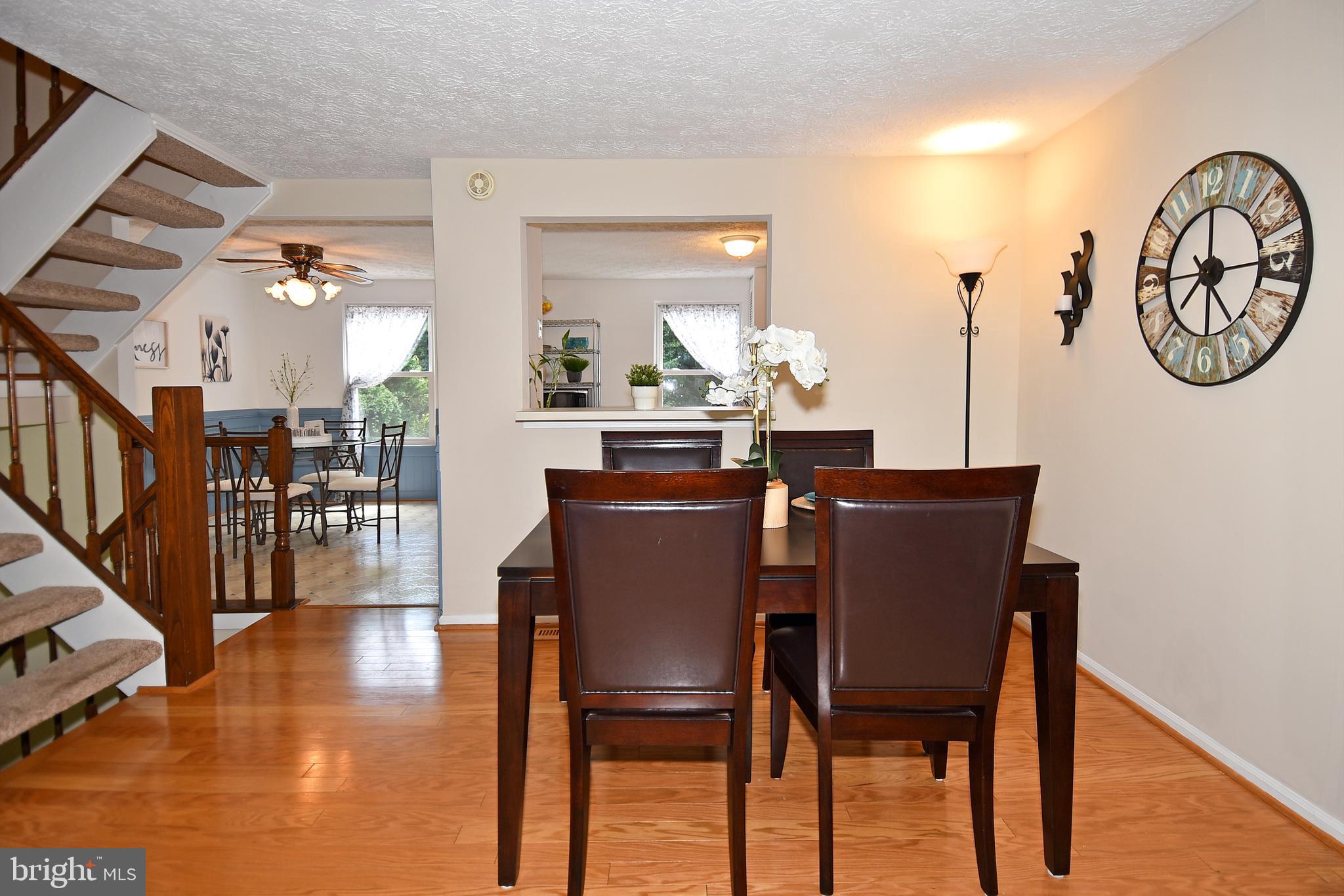 6591 Forest Dew Court Springfield, VA 22152 - Photo 8 of 39 Dining Room connects the living area and kitchen