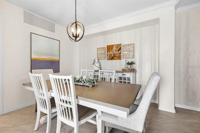 a view of a dining room with furniture