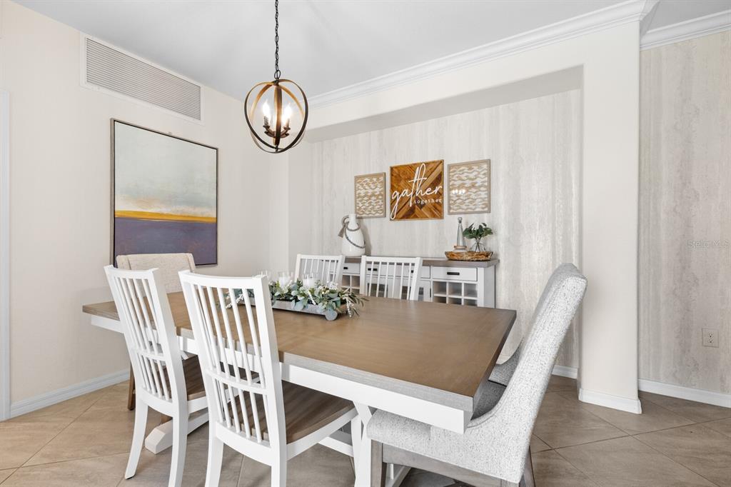 18117 Gawthrop Drive, Unit 104 Bradenton, FL 34211 - Photo 14 of 54 a view of a dining room with furniture