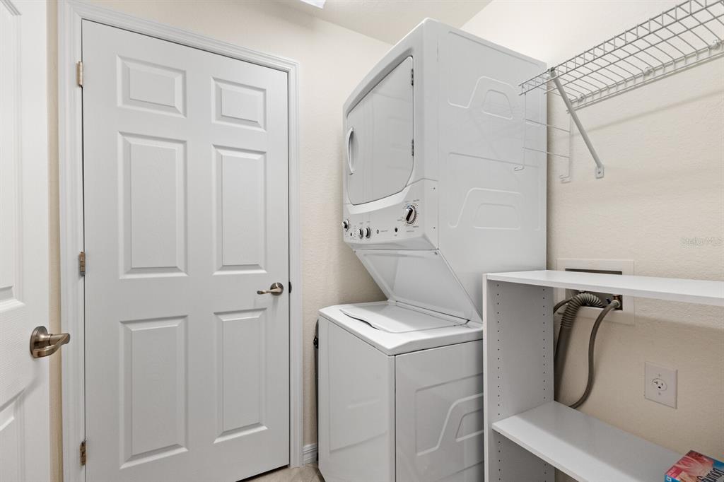 18117 Gawthrop Drive, Unit 104 Bradenton, FL 34211 - Photo 24 of 54 a utility room with dryer and washer