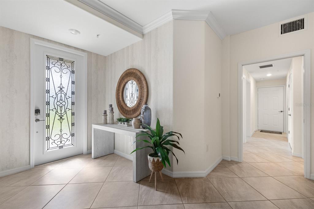 18117 Gawthrop Drive, Unit 104 Bradenton, FL 34211 - Photo 6 of 54 a living room with furniture and a window