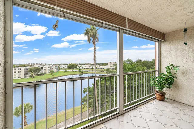 a view of a lake with a city