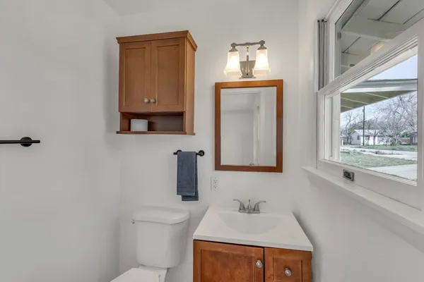 a view of a backyard with chairs