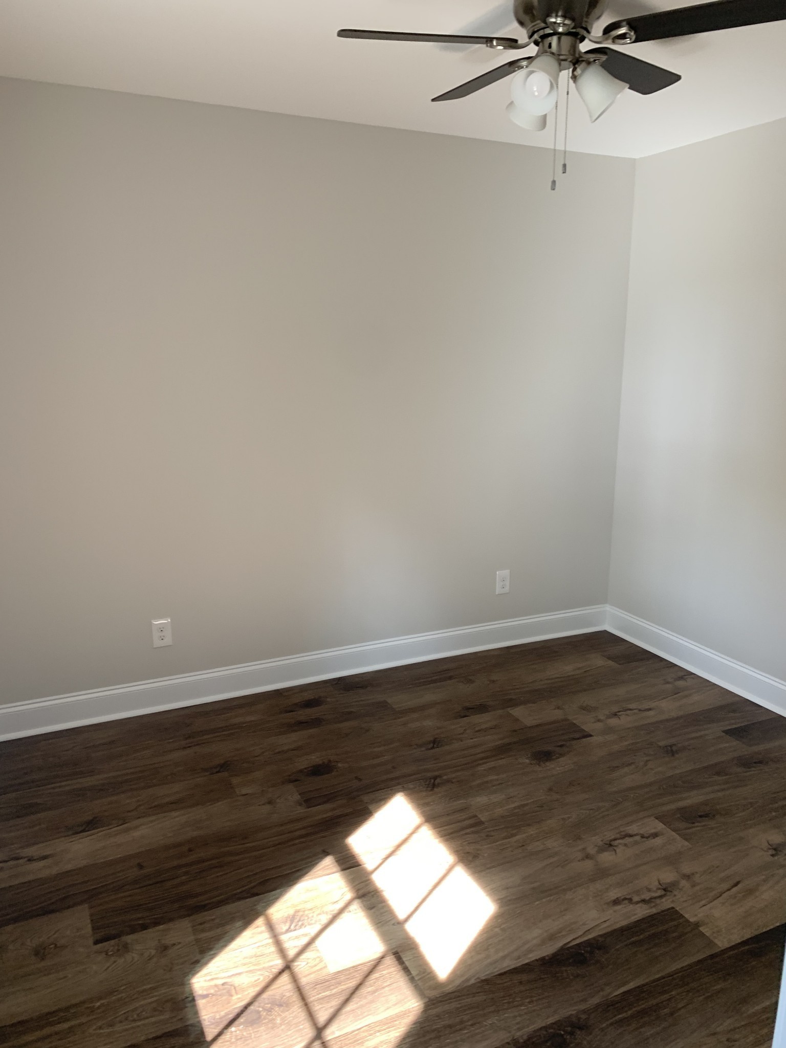 105 Curt Alsup Way Pulaski, TN 38478 - Photo 6 of 7 a view of a room with a window and wooden floor