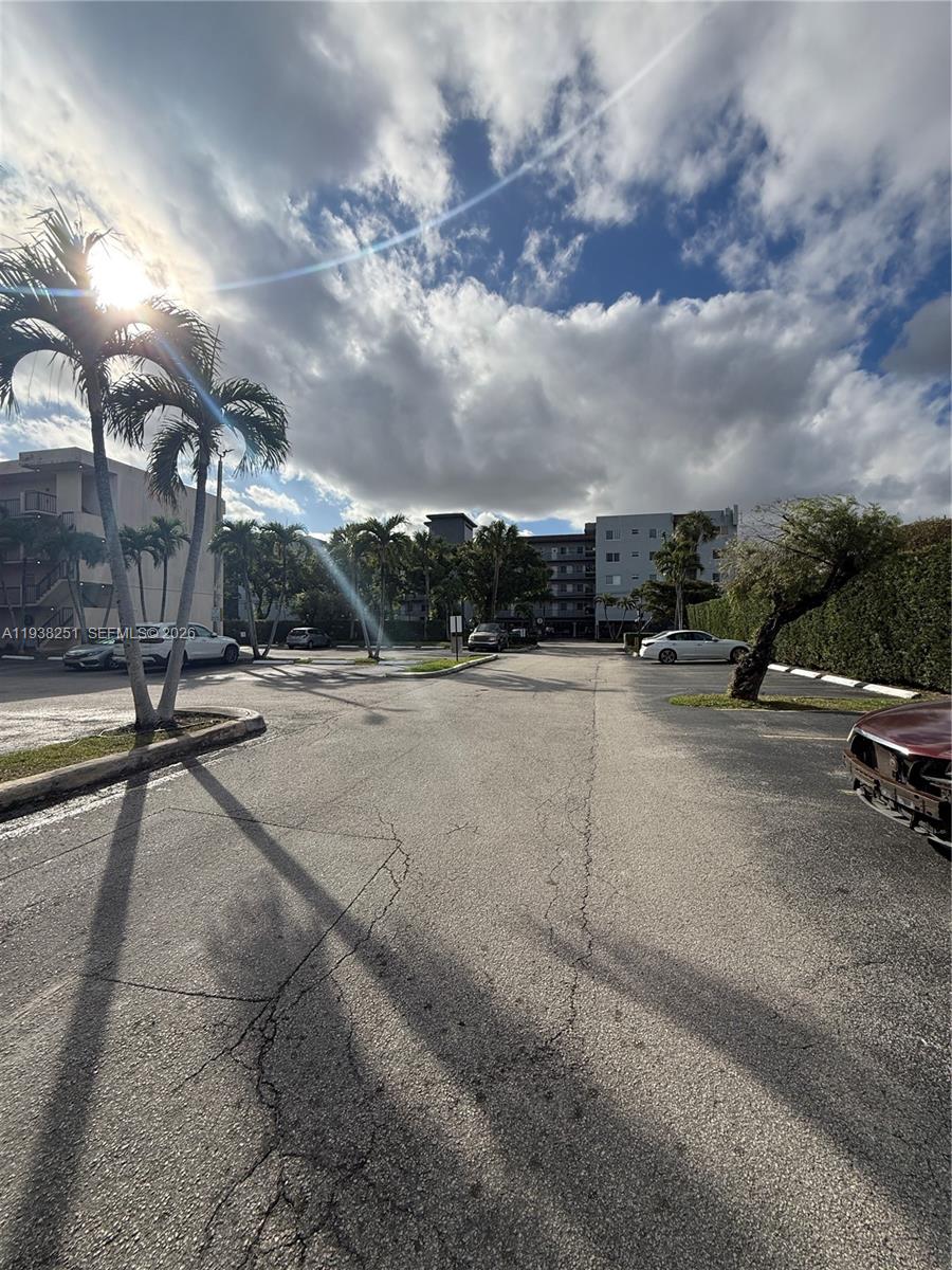 995 Southwest 84th Avenue, Unit 304 Miami, FL 33144 - Photo 15 of 15 a view of outdoor space with playground and green space