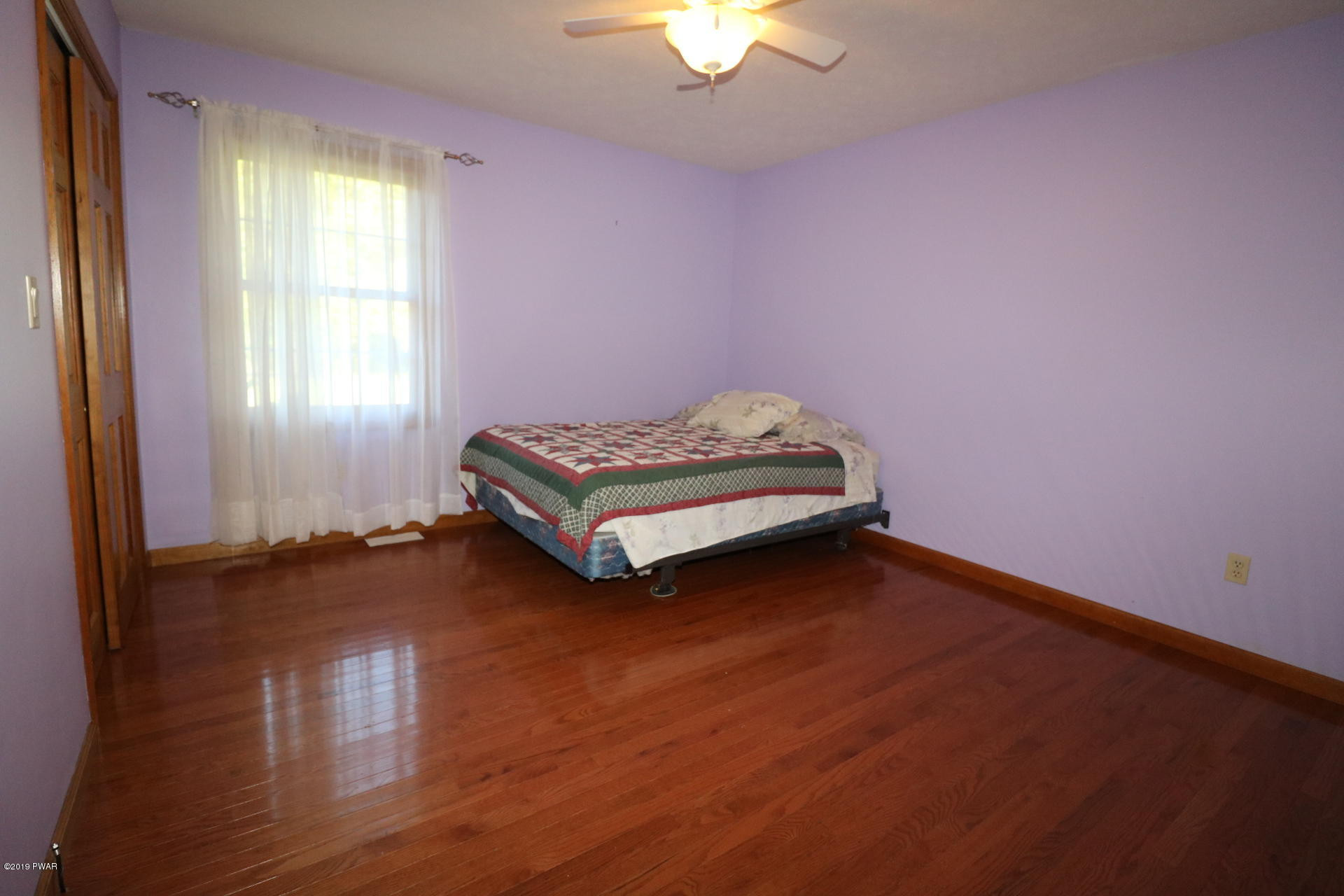 53 Savitz Road Lake Ariel, PA 18436 - Photo 40 of 53 a bedroom with a bed and a window