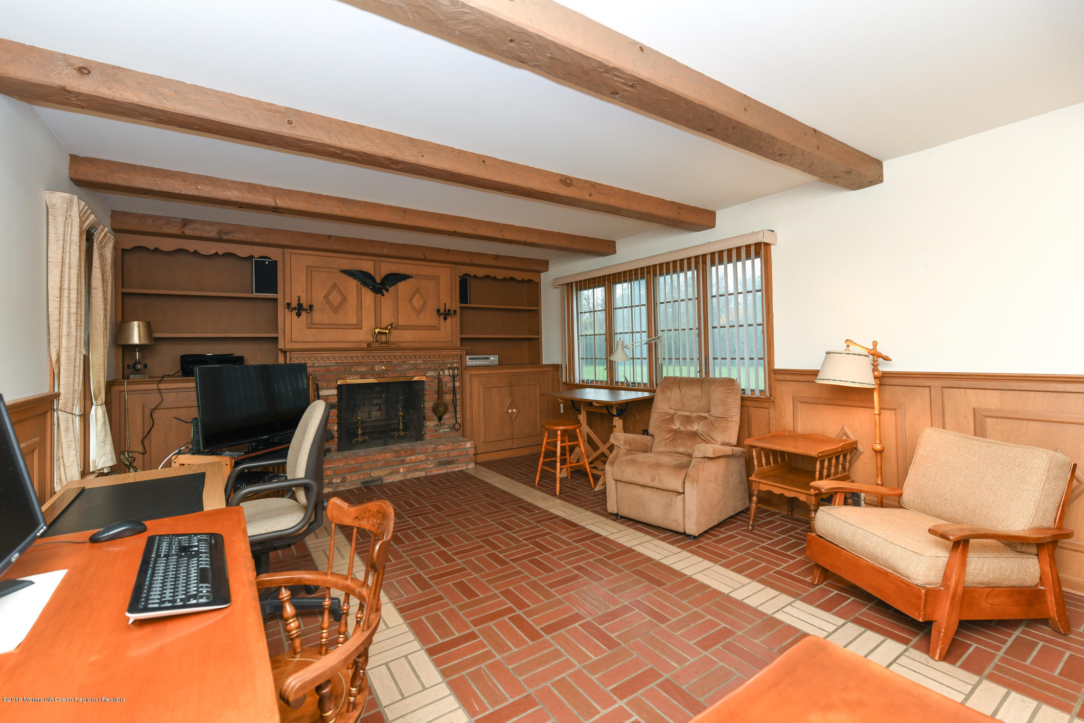 2 Green Hill Road Colts Neck, NJ 07722 - Photo 11 of 30 a living room with furniture and a fireplace