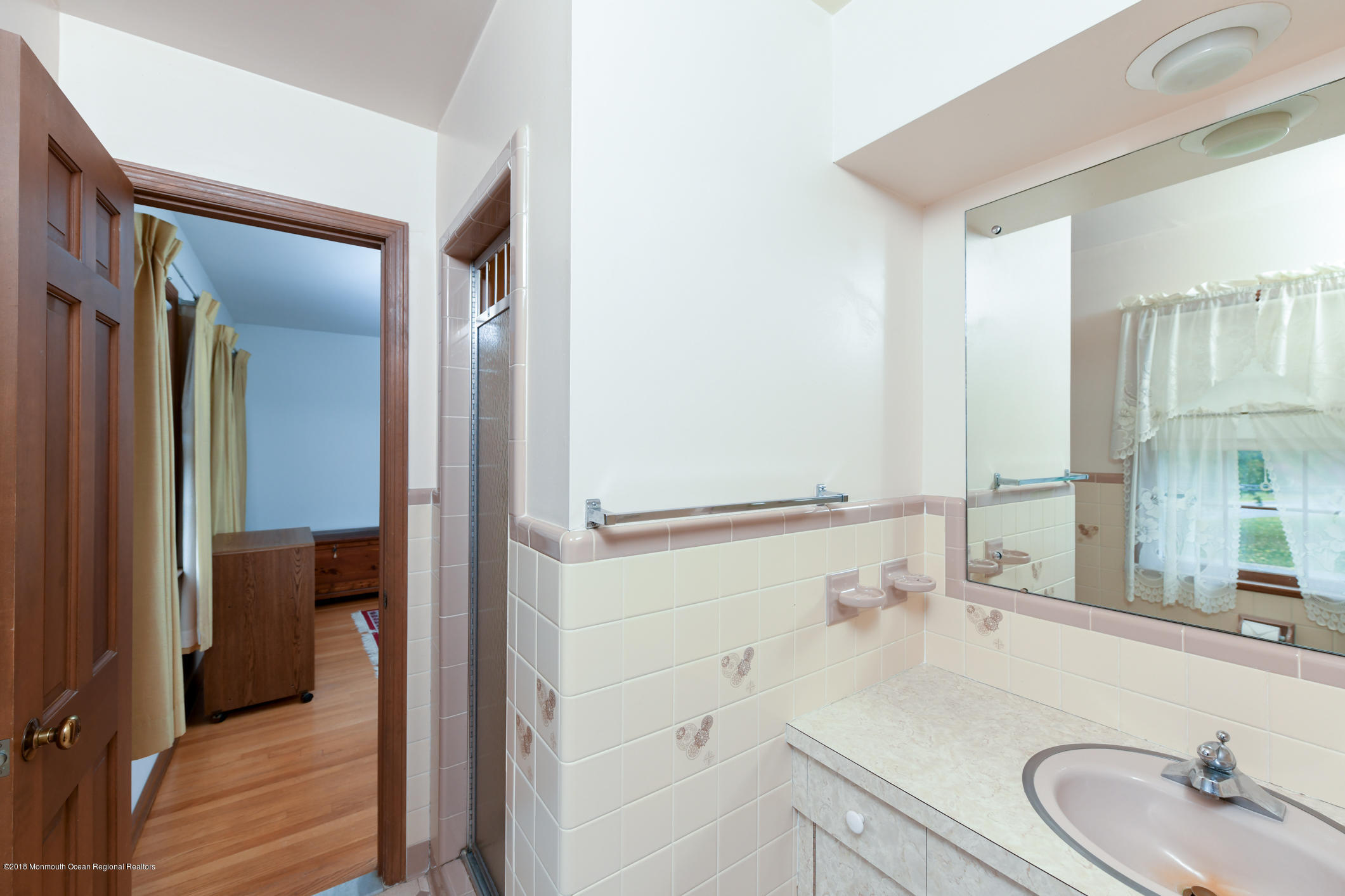 2 Green Hill Road Colts Neck, NJ 07722 - Photo 19 of 30 a bathroom with a sink and a mirror