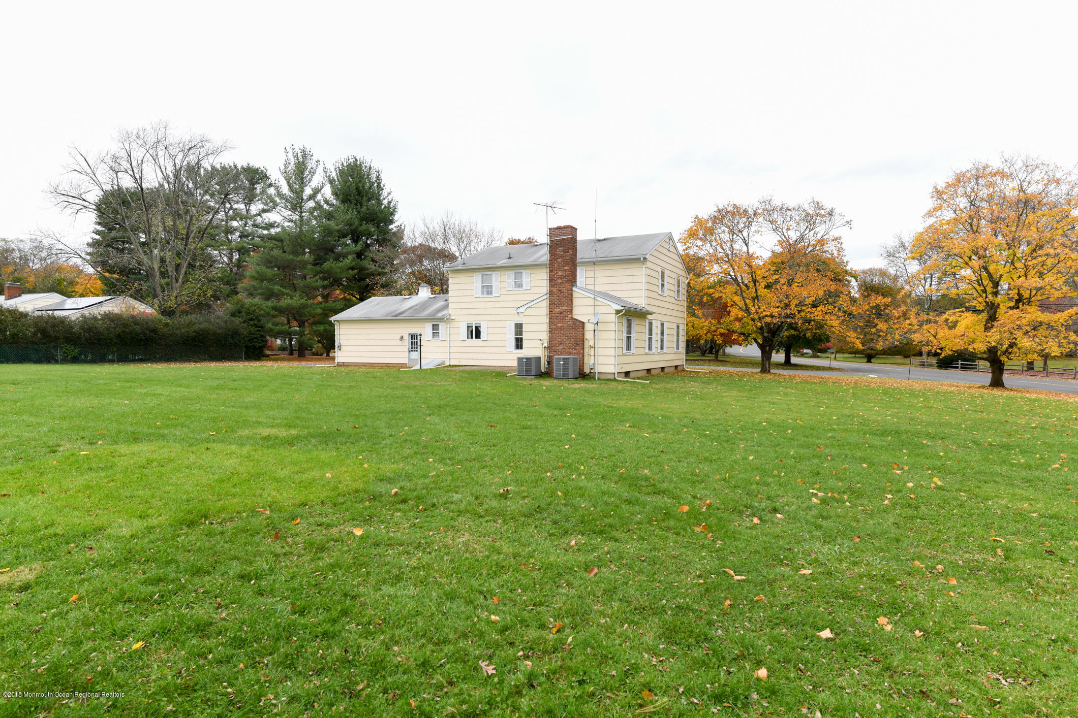 2 Green Hill Road Colts Neck, NJ 07722 - Photo 28 of 30 a view of a house with a big yard and large trees