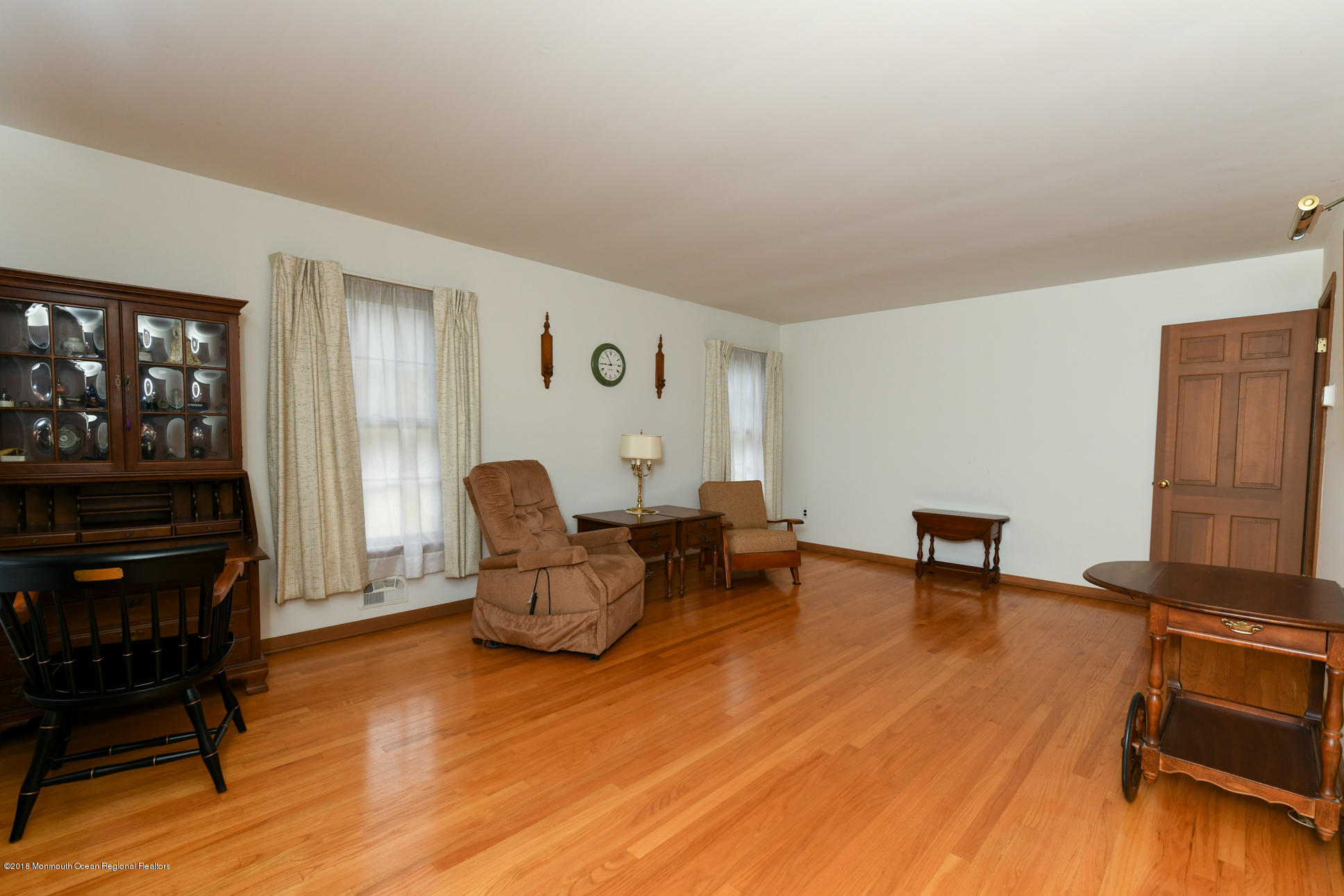 2 Green Hill Road Colts Neck, NJ 07722 - Photo 7 of 30 a living room with furniture and a flat screen tv