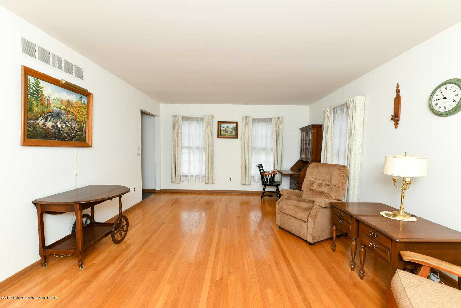 2 Green Hill Road Colts Neck, NJ 07722 - Photo 8 of 30 a living room with furniture and a table