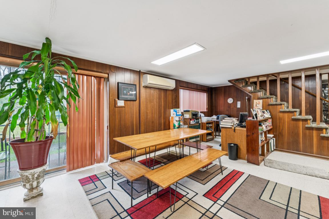4910 Stan Haven Road Temple Hills, MD 20748 - Photo 14 of 25 a living room with furniture and a potted plant