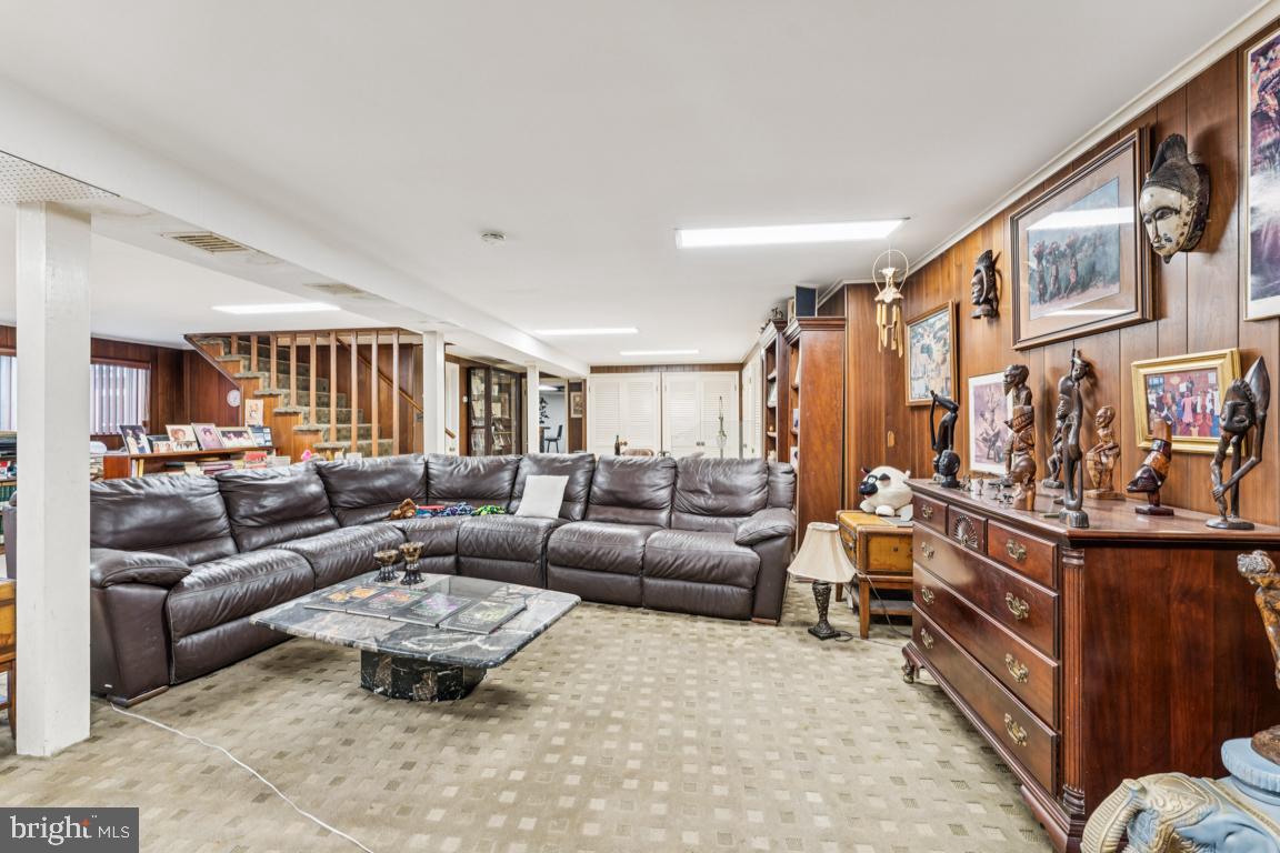 4910 Stan Haven Road Temple Hills, MD 20748 - Photo 16 of 25 a living room with furniture and a couch