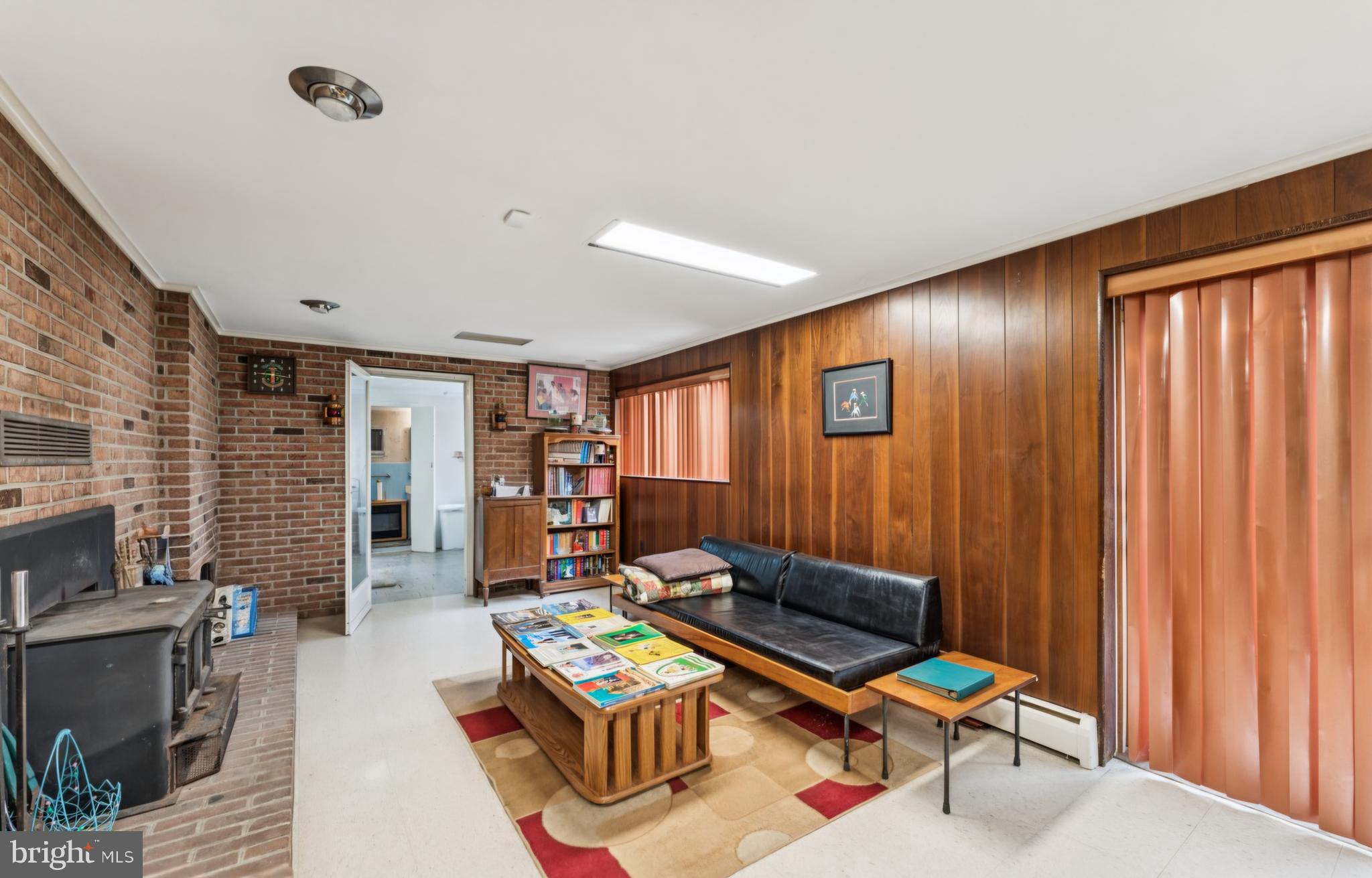 4910 Stan Haven Road Temple Hills, MD 20748 - Photo 17 of 25 a living room with furniture and wooden floor