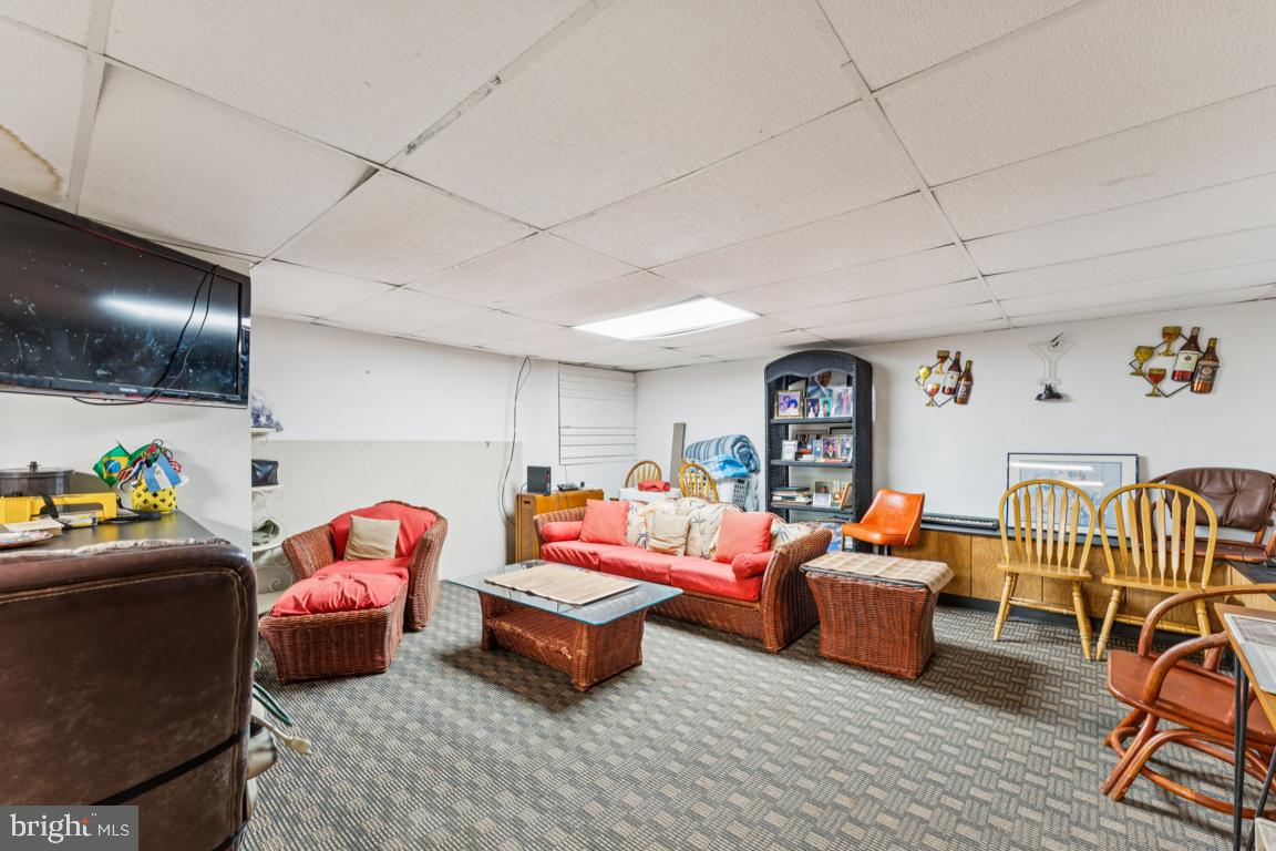 4910 Stan Haven Road Temple Hills, MD 20748 - Photo 19 of 25 a bedroom with furniture and a window