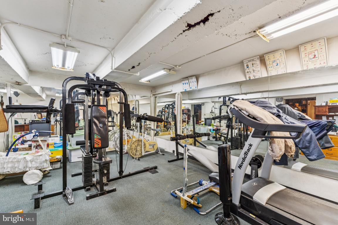 4910 Stan Haven Road Temple Hills, MD 20748 - Photo 21 of 25 a view of a room with gym equipment