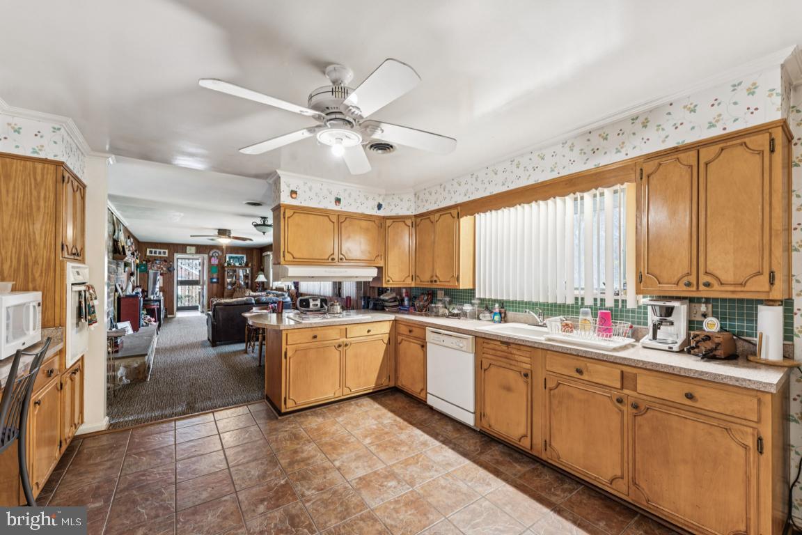 4910 Stan Haven Road Temple Hills, MD 20748 - Photo 5 of 25 a kitchen with lots of counter top space and appliances