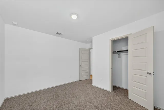 an empty room with closet