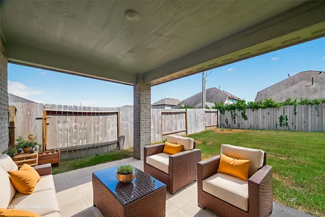 a outdoor living space with furniture and garden view