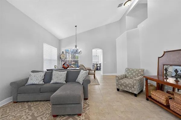 a living room with furniture and a couch
