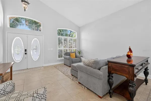 a living room with furniture and window