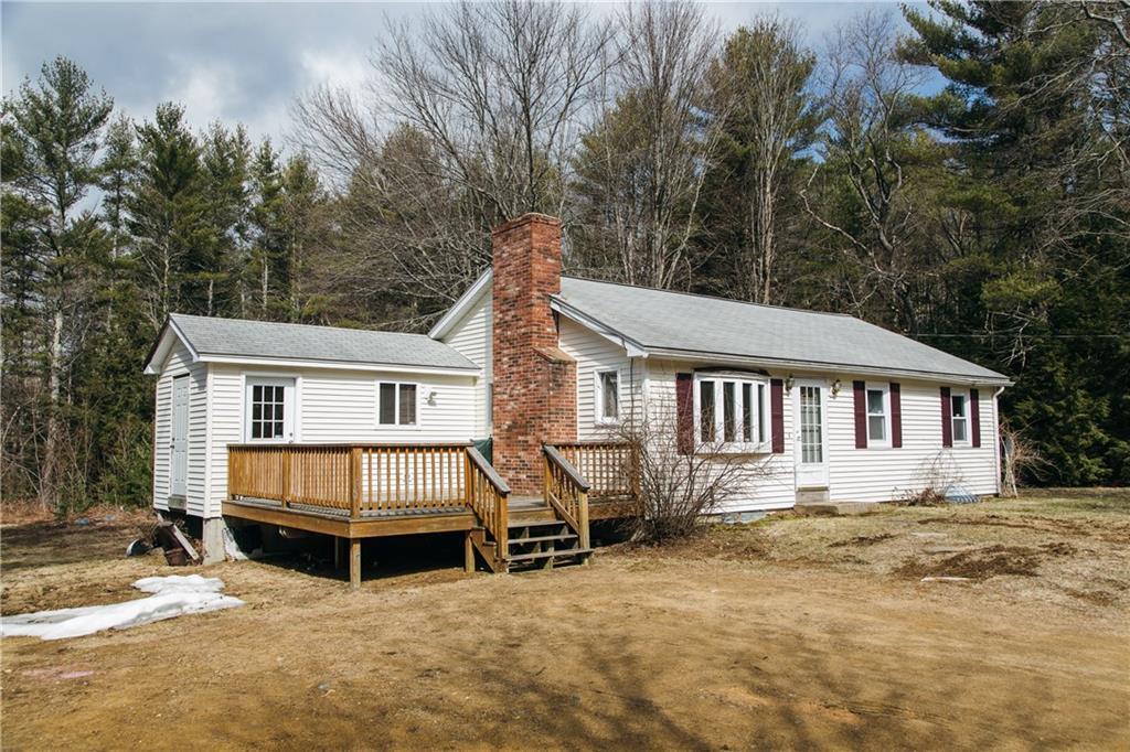 103 Long Swamp Road Lebanon, ME 04027 - Photo 3 of 24 The front deck is a great spot to...