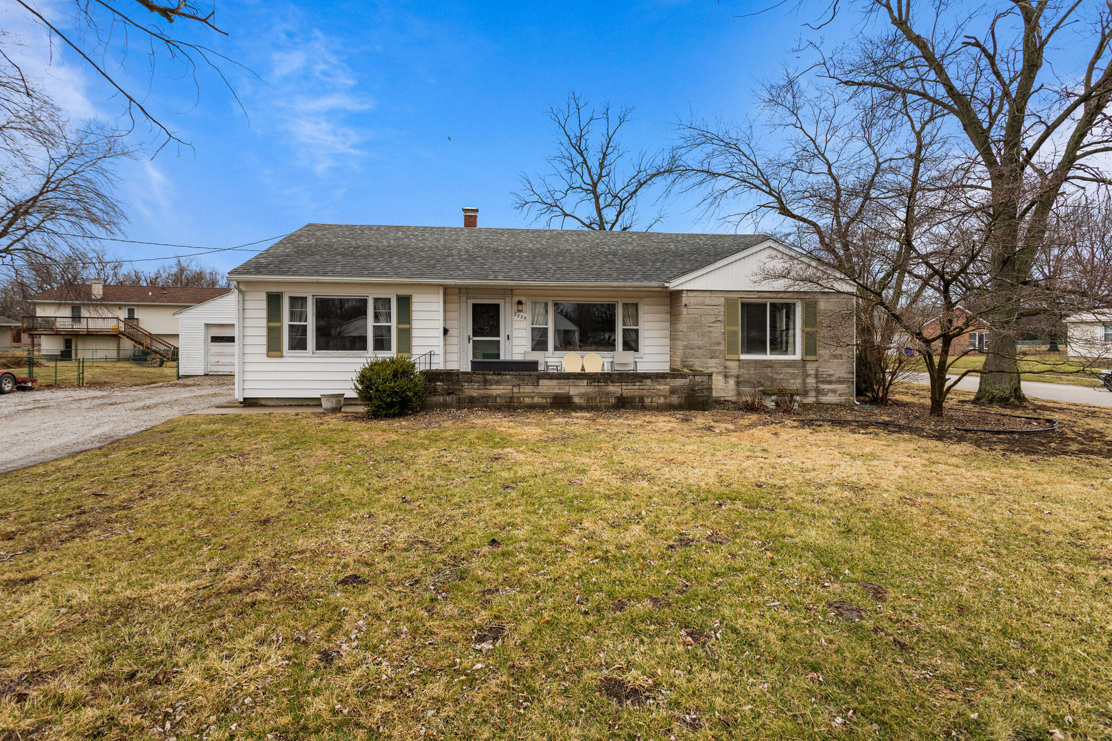 a front view of a house with yard