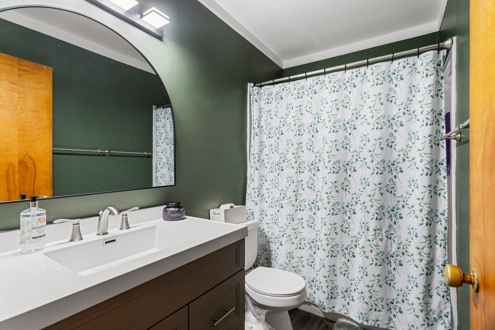 3235 West Main Street Decatur, IL 62522 - Photo 20 of 30 a bathroom with a sink and a mirror