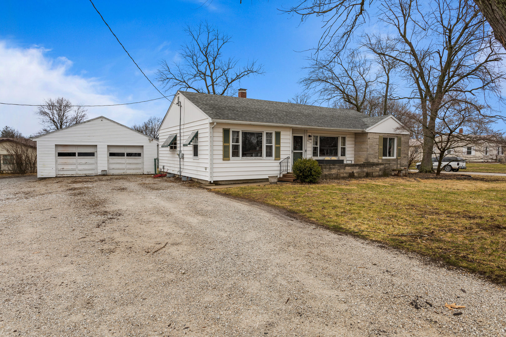3235 West Main Street Decatur, IL 62522 - Photo 2 of 30 a front view of a house with a yard