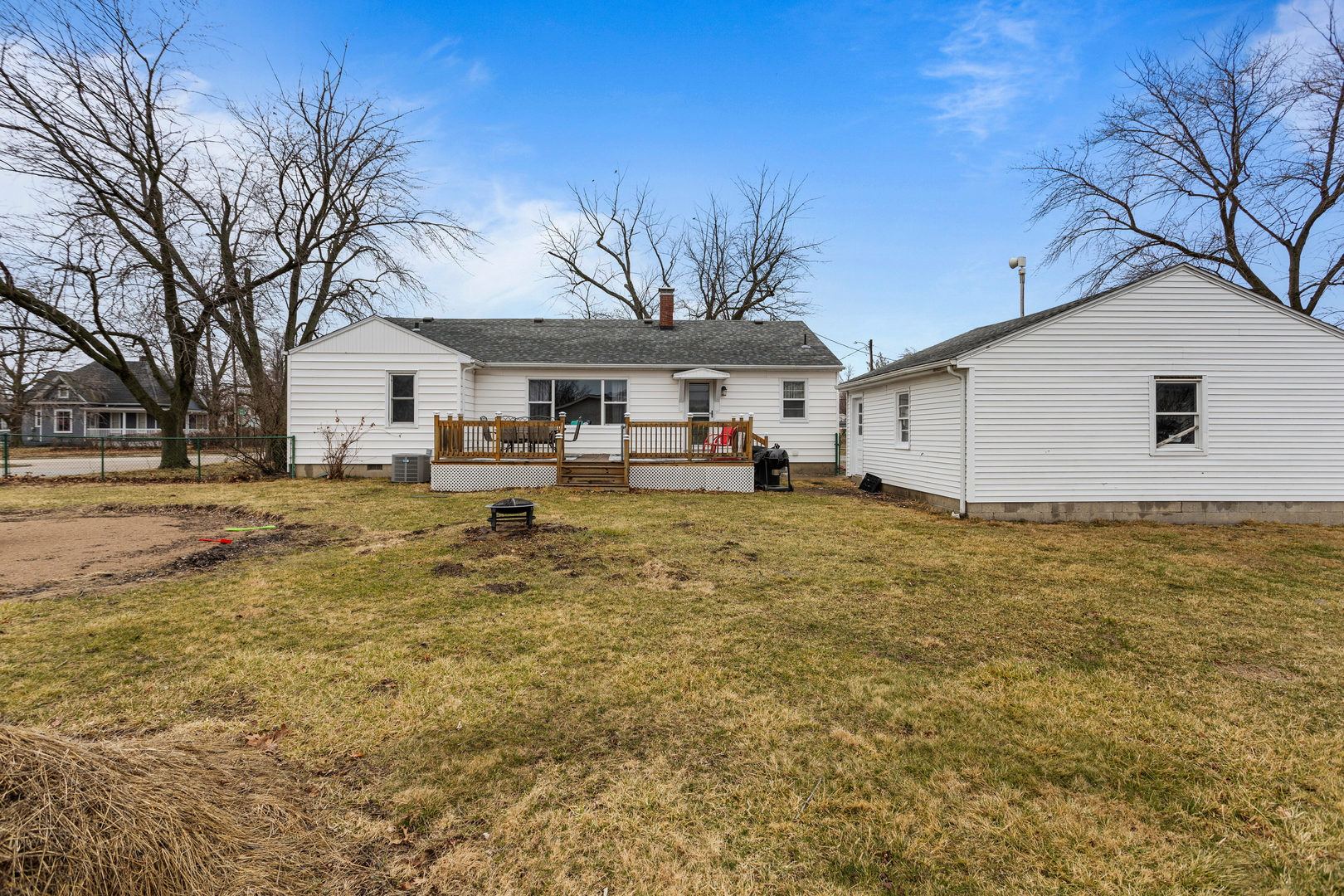 3235 West Main Street Decatur, IL 62522 - Photo 26 of 30 a front view of a house with a yard