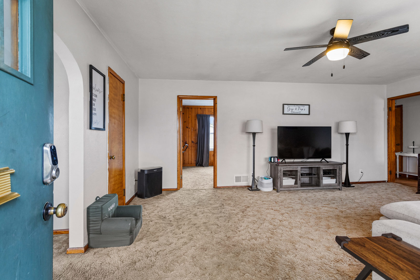 3235 West Main Street Decatur, IL 62522 - Photo 5 of 30 a living room with furniture and a flat screen tv