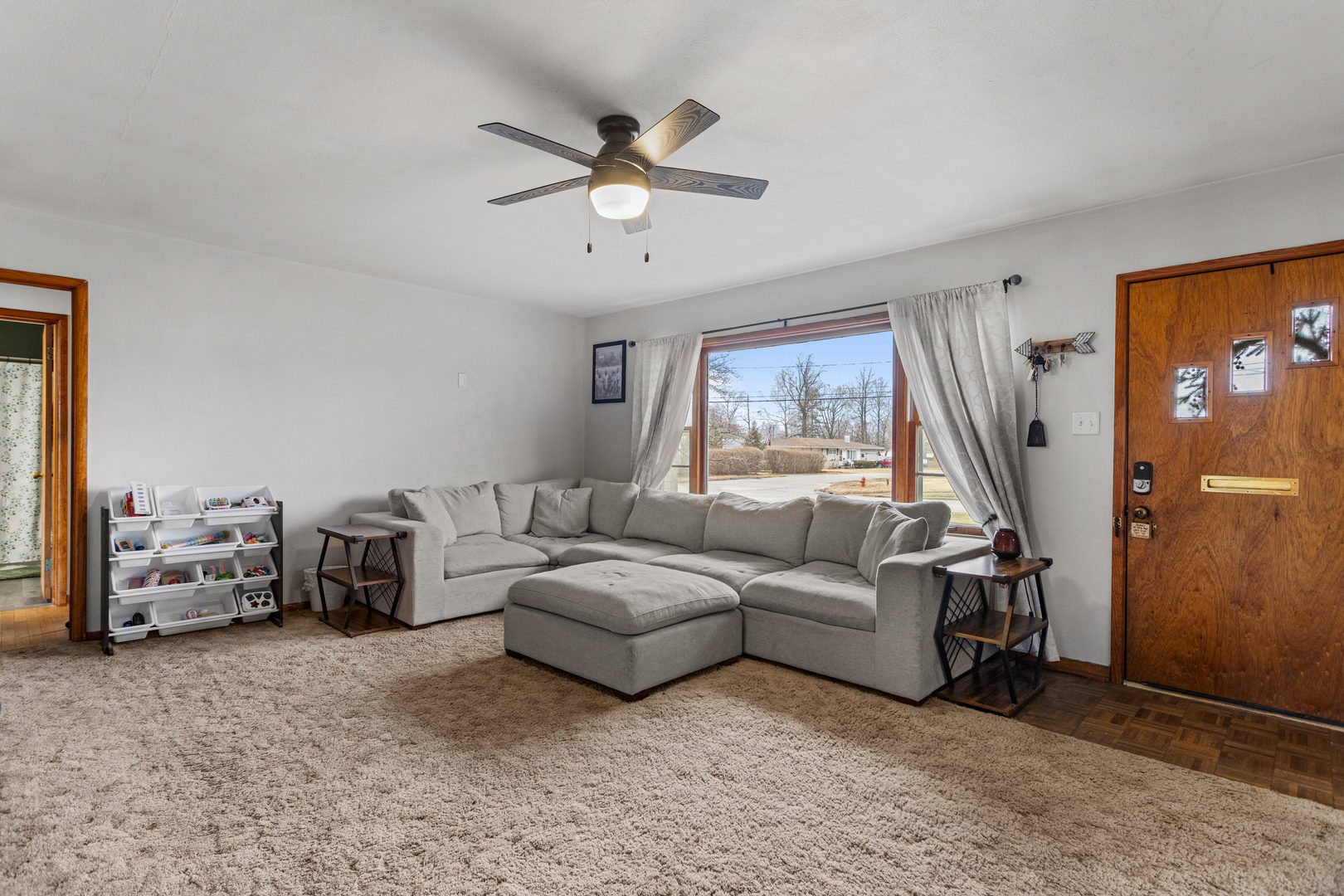 3235 West Main Street Decatur, IL 62522 - Photo 6 of 30 a living room with furniture and a large window