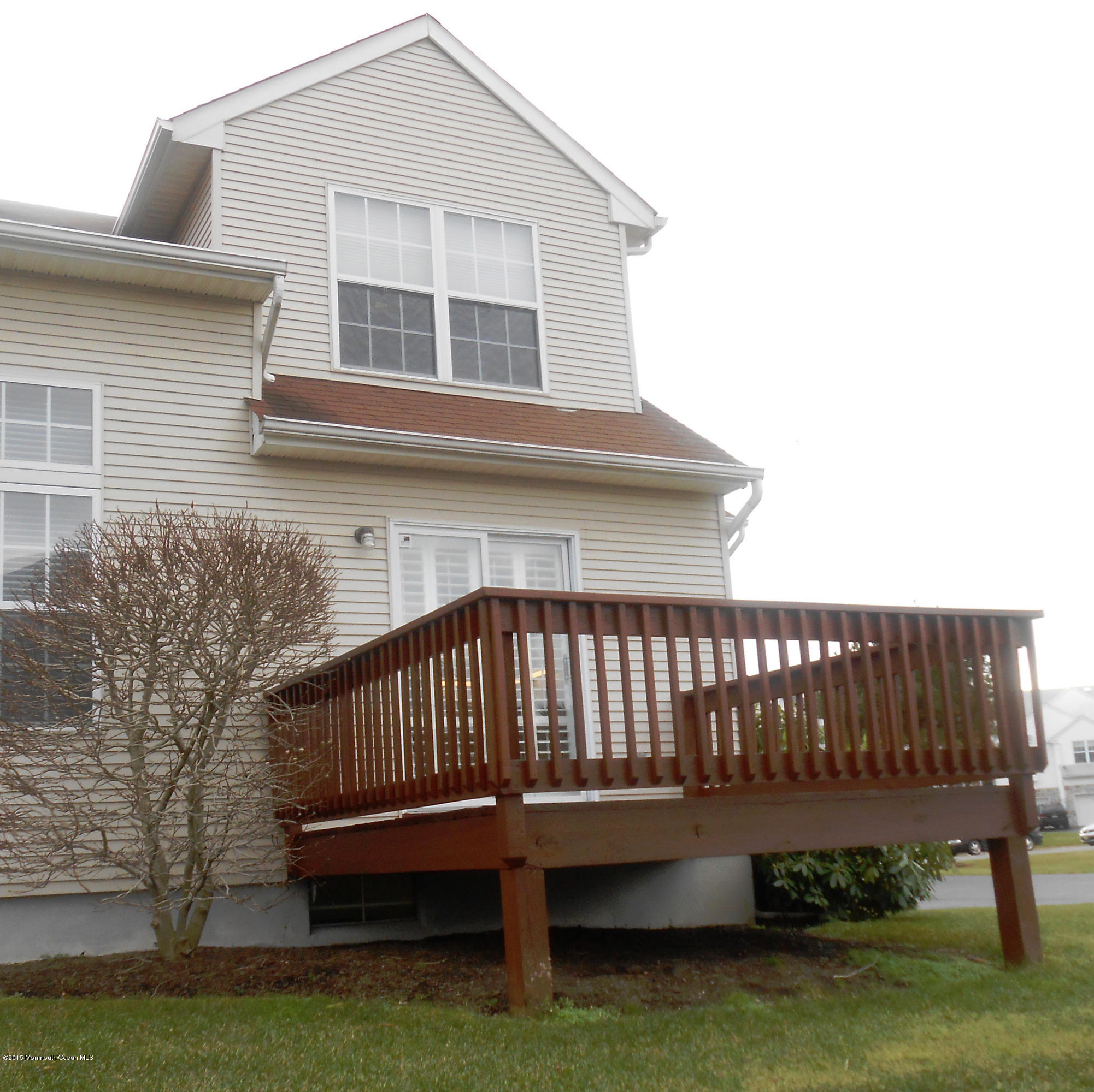 61 Racquet Road Wall, NJ 07719 - Photo 2 of 15 a view of backyard with deck